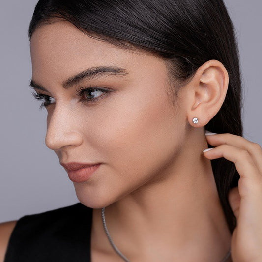 4-claw round brilliant one carat stud earrings